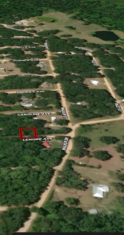 An aerial map view shows a rectangular property lot outlined in red near a dirt road — LOT 34 LENORE AVENUE, INTERLACHEN, FL