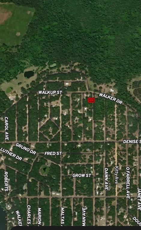 This is an aerial map showing a highlighted property lot within a residential neighborhood — LOT 34 LENORE AVENUE, INTERLACHEN, FL