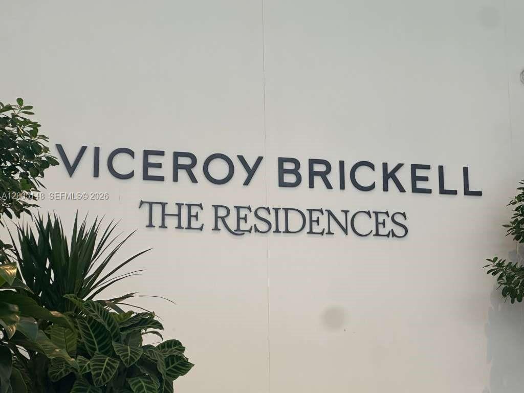 The sign for Viceroy Brickell The Residences is mounted on a plain white wall — 77 SE 5th Street # 1815, Miami FL 33131, MIAMI, FL