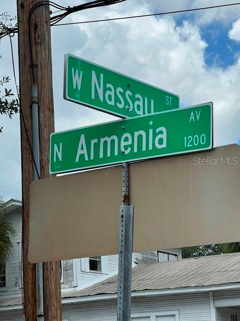 A street sign shows the intersection of West Nassau Street and North Armenia Avenue — 1202 N ARMENIA AVENUE, TAMPA, FL