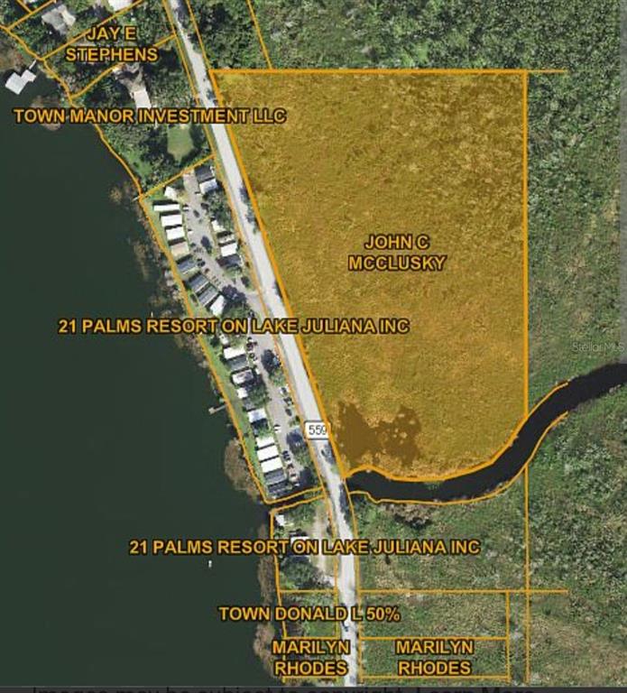 This map shows property boundaries overlaid on an aerial view of land near a lake — 0 CR-559, AUBURNDALE, FL