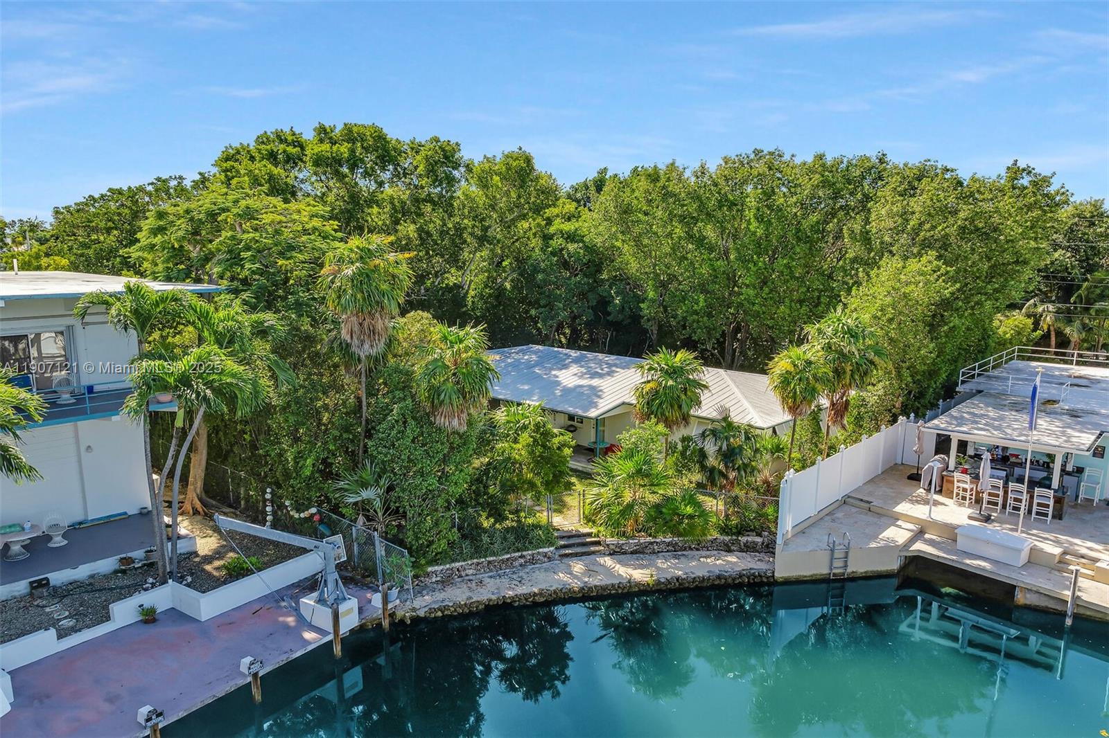Concrete home with two 2019 ACs — TAVERNIER, FL
