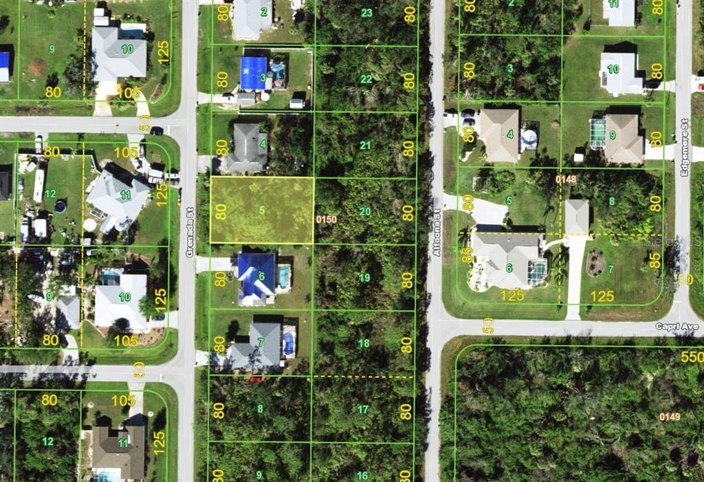 This is a satellite map showing residential lots, streets, and houses in a suburban neighborhood — 357 GRENADA STREET NW, PORT CHARLOTTE, FL