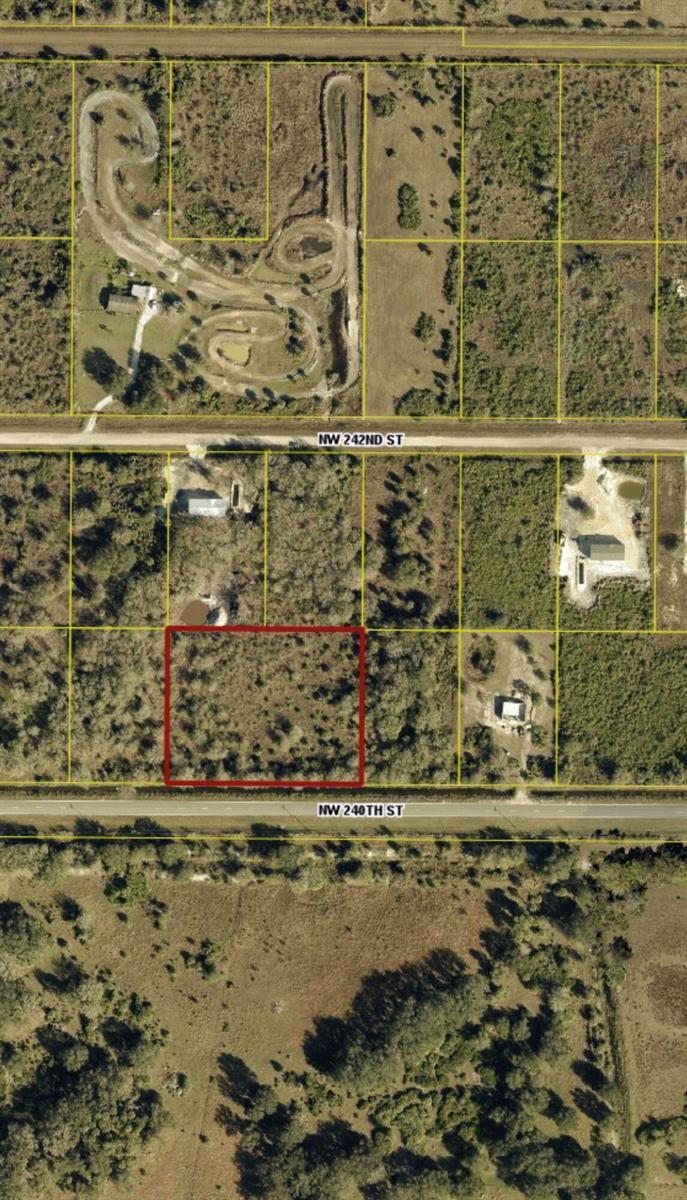 An aerial map view shows a rectangular plot of land outlined in red — 18923 NW 240th Street, Okeechobee FL 34972, OKEECHOBEE, FL