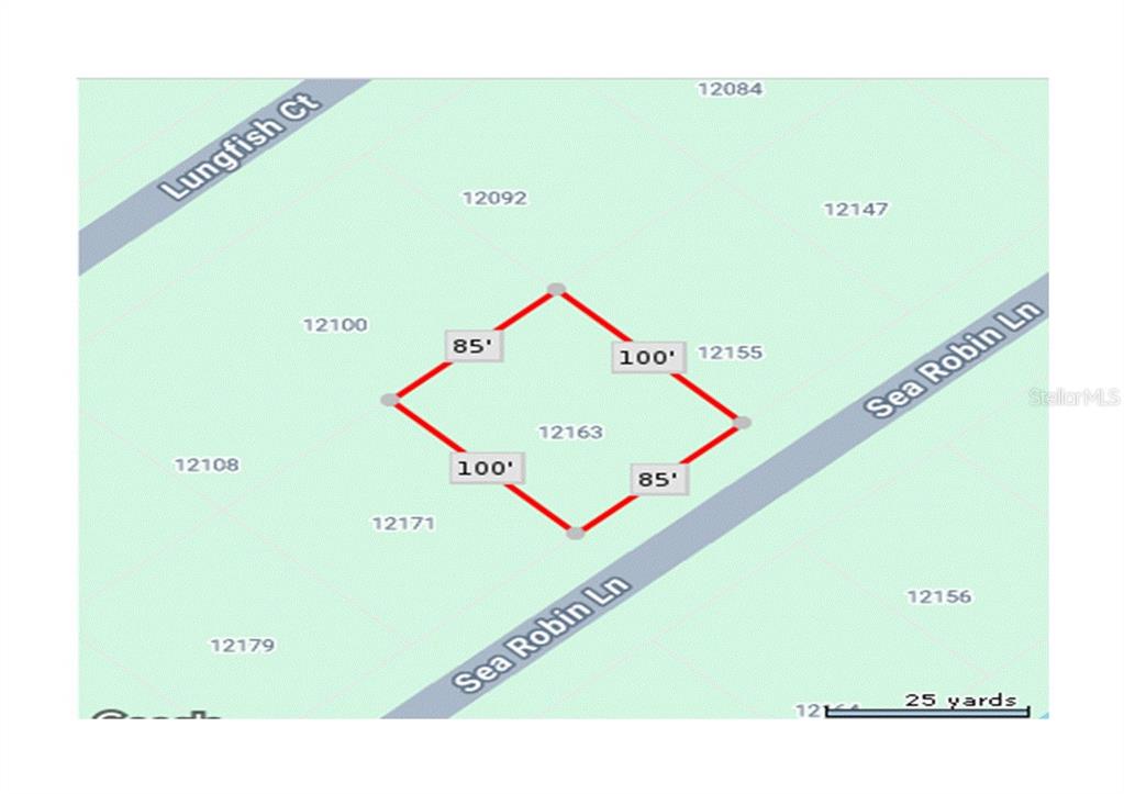 This is a map showing the property boundaries and dimensions of a residential lot — 12163 SEA ROBIN LANE, PLACIDA, FL