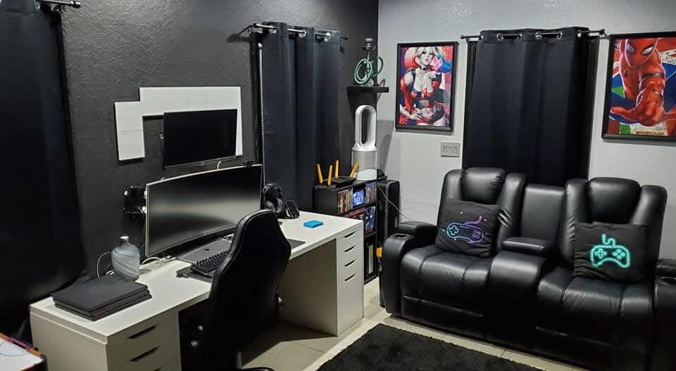 A home office and media room featuring a desk, curved monitor, and black leather sofa — 7620 NW 38th Court, Sunrise FL 33351, SUNRISE, FL