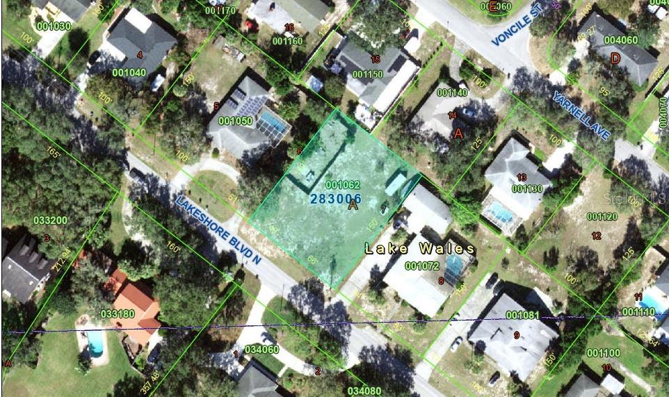 This is an aerial map showing a vacant residential lot highlighted in green — 0 LAKESHORE BOULEVARD N, LAKE WALES, FL