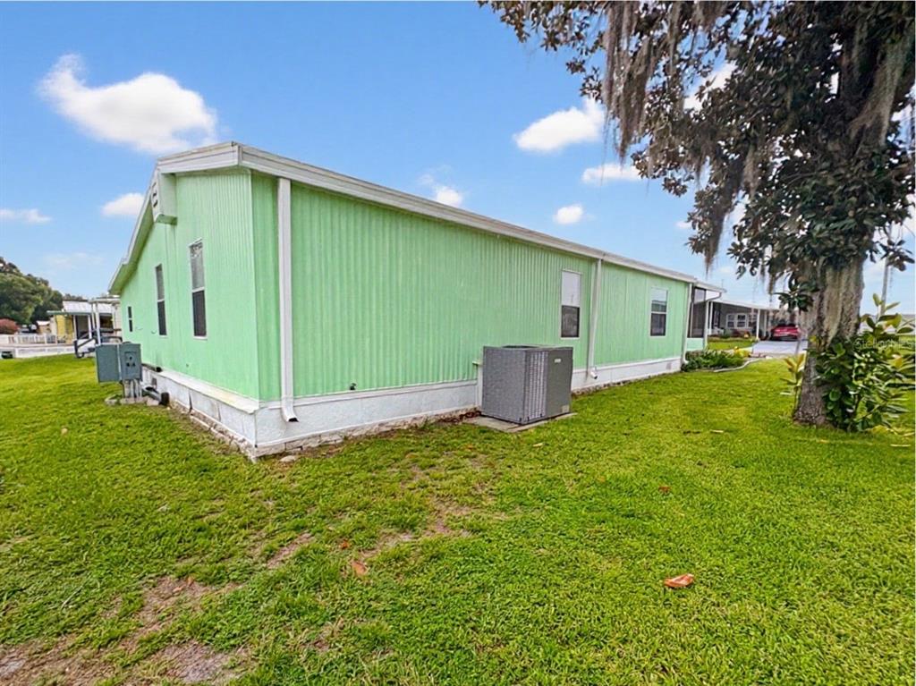 413 S TIMBER TRAIL, WILDWOOD, FL — photo 4 of 21