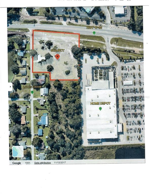 This aerial map shows a vacant lot outlined in red next to a Home Depot — 1714 LOUIS DRIVE, KISSIMMEE, FL