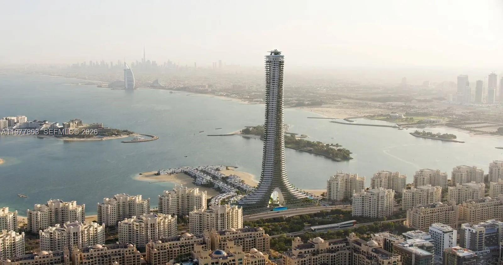 This is a rendering of a tall, slender skyscraper located on a waterfront in Dubai — PJCRC17 Ittihad Rd # 0, Dubai, FL
