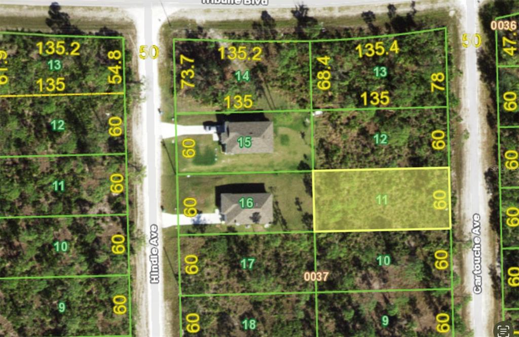 This is a plat map showing a highlighted vacant residential lot among neighboring properties — 12285 CARTOUCHE AVENUE, PUNTA GORDA, FL