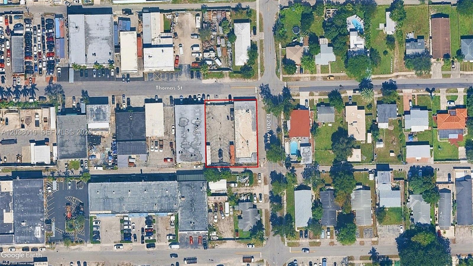 This aerial map shows a rectangular commercial lot outlined in red at a street intersection — 2216 N 20th Ave, Hollywood FL 33020, HOLLYWOOD, FL