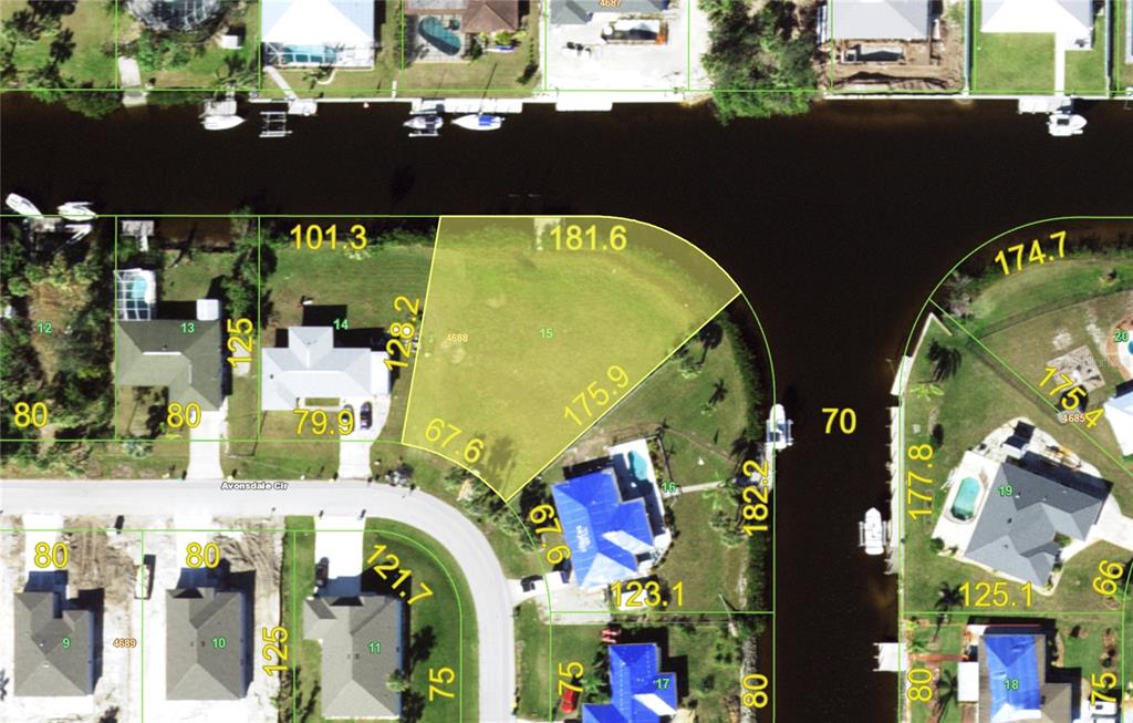 This is a satellite map showing a vacant residential lot situated on a canal — 18106 AVONSDALE CIRCLE, PORT CHARLOTTE, FL