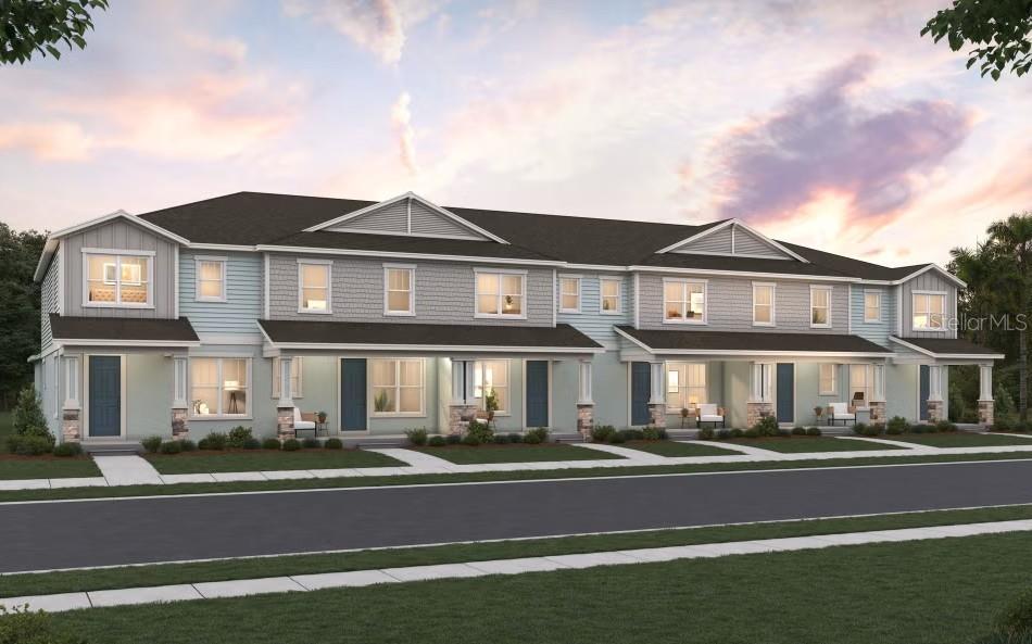 A digital rendering of a multi-unit townhouse building with light blue siding and gray roofs — 7280 WINDY WILLOW STREET, WINTER GARDEN, FL