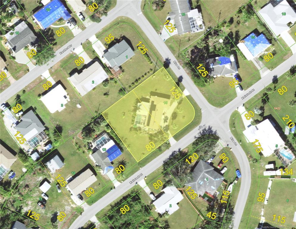 This is an aerial map showing property lot lines and parcel numbers for a neighborhood — 644 BLUE LANE NW, PORT CHARLOTTE, FL