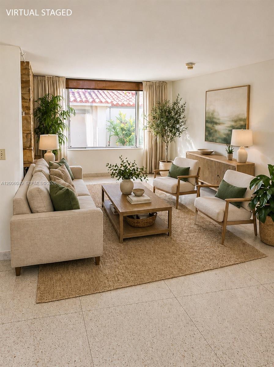 This virtual staging shows a living room with a sofa, two armchairs, and a coffee table — 9205 Byron Ave, Surfside FL 33154, SURFSIDE, FL