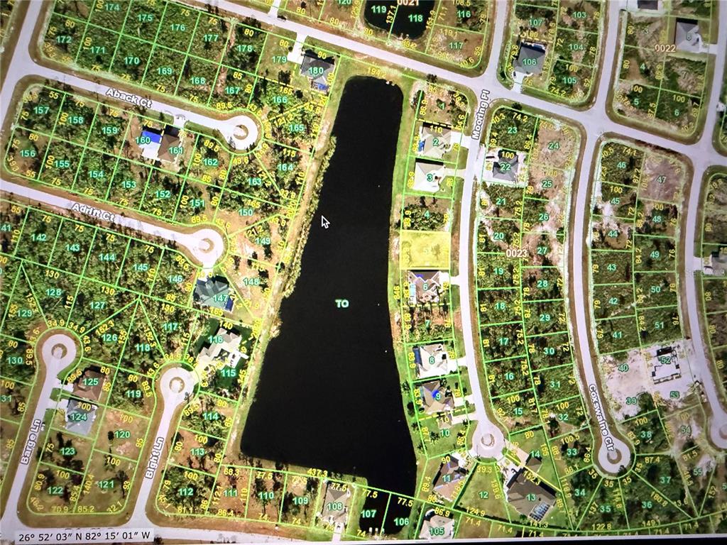 This is a map of a residential neighborhood featuring a large central lake — 16 MOORING PLACE, PLACIDA, FL