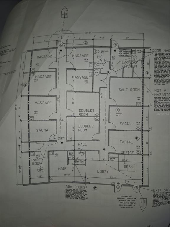 This is a floor plan for a spa facility featuring multiple treatment rooms, a lobby, and bathrooms — 5434 LAND O LAKES BOULEVARD, LAND O LAKES, FL