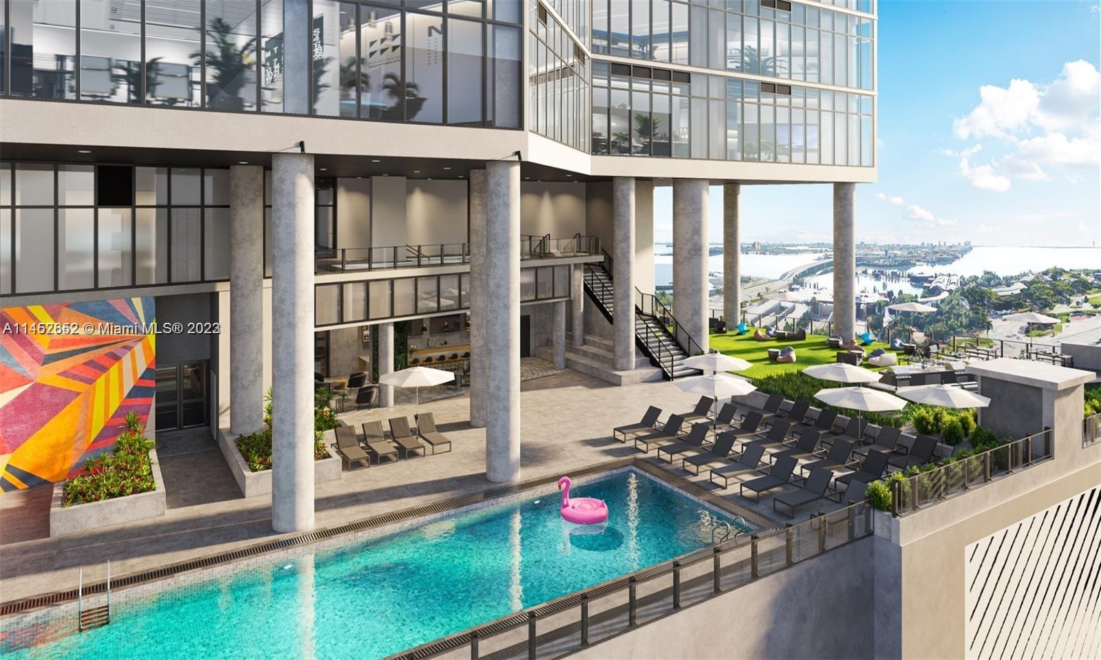 This rendering shows an outdoor pool deck with lounge chairs, umbrellas, and a grassy area — 398 NE 5th St # 1417, Miami FL 33132, MIAMI, FL