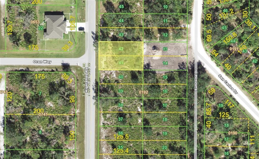This is a satellite map showing two highlighted adjacent residential lots in a wooded area — 1200 HIGHLANDS ROAD, PUNTA GORDA, FL