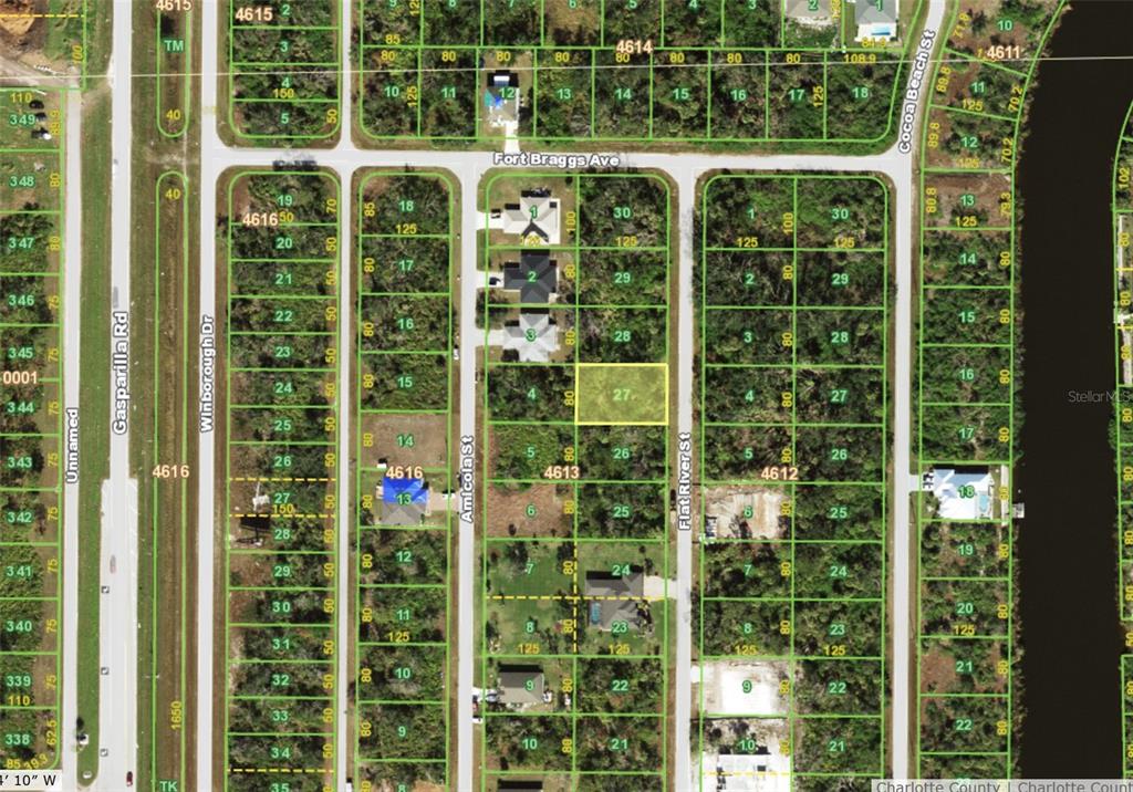 This is a satellite map showing residential lots and street layouts in a neighborhood — 10047 FLAT RIVER STREET, PORT CHARLOTTE, FL