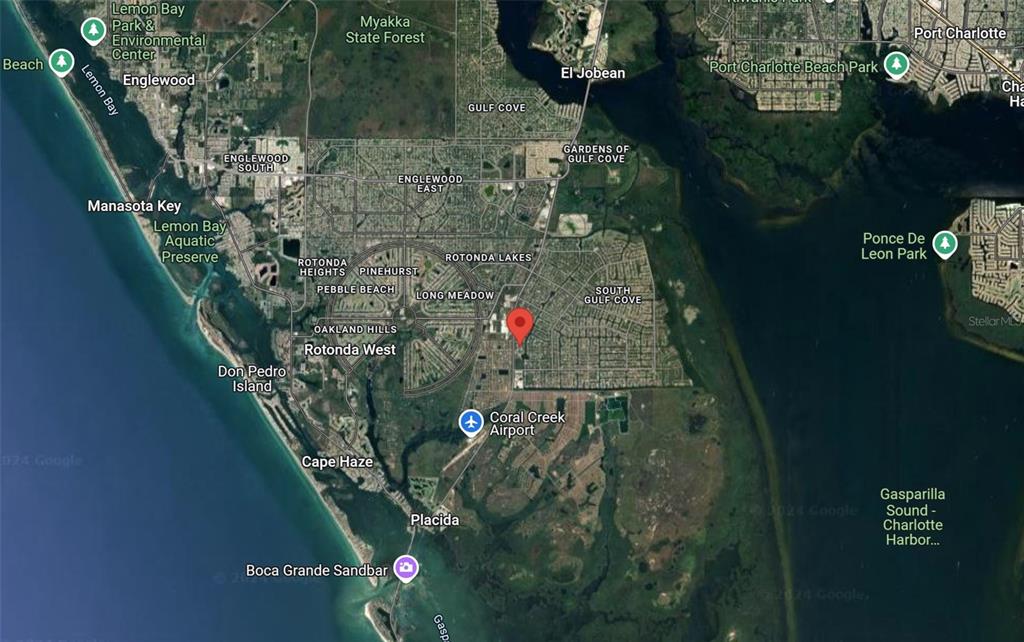This is a satellite map showing the Rotonda West area of Florida with a location pin — 10047 FLAT RIVER STREET, PORT CHARLOTTE, FL