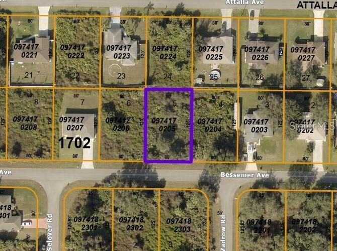 This is an aerial map showing a highlighted vacant residential lot among other properties — BESSEMER AVENUE, NORTH PORT, FL