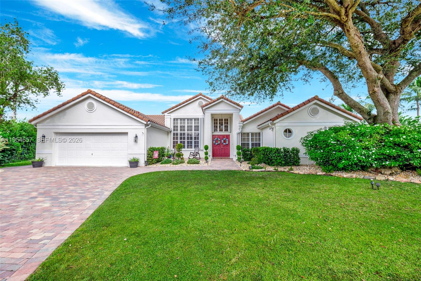 9421 Hollyhock Ct, Davie FL 33328
