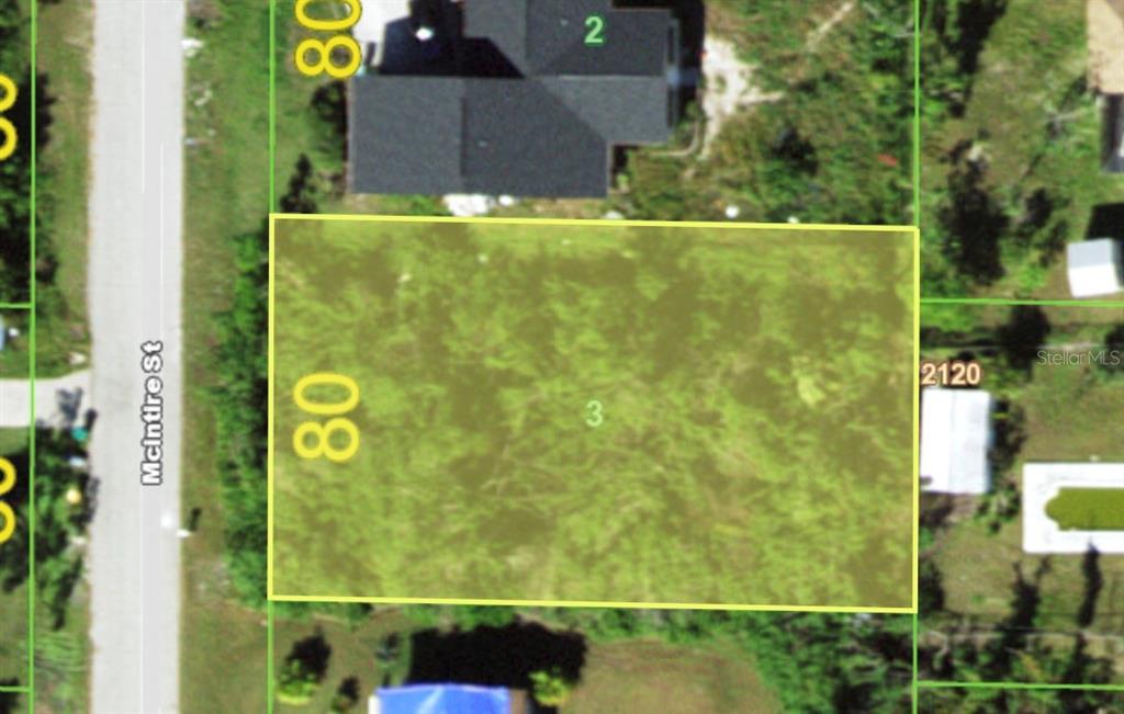 This is an aerial map showing a rectangular residential lot highlighted in yellow — 4026 MCINTIRE STREET, PORT CHARLOTTE, FL