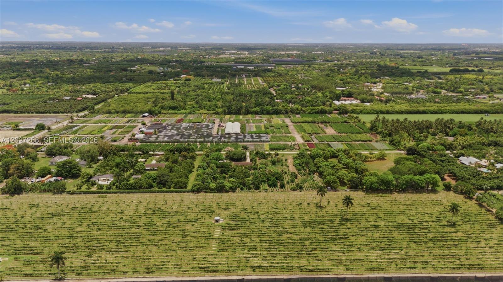 An aerial view shows a large agricultural property with rows of crops and nursery plants — 25800 SW 199th Ave, Homestead FL 33031, HOMESTEAD, FL