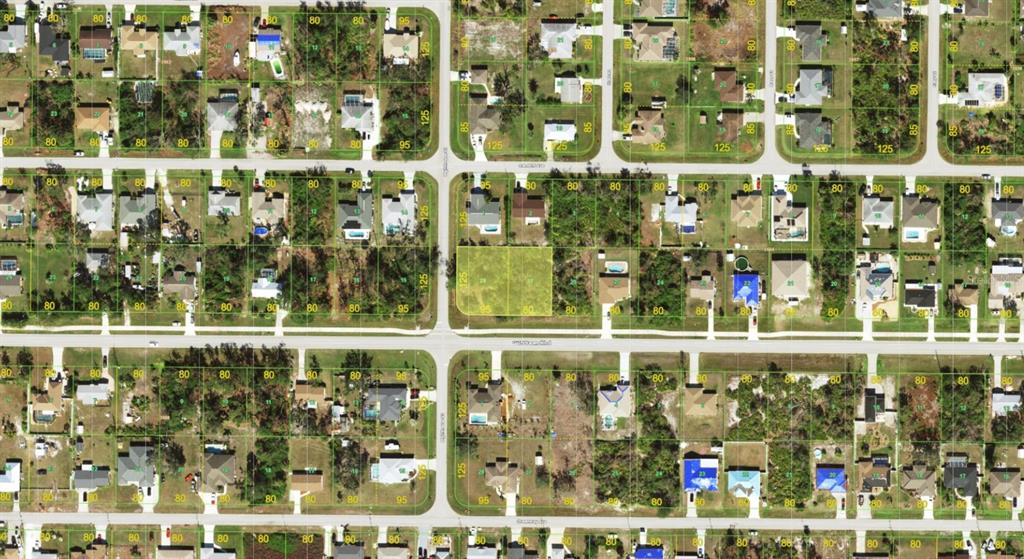 This is an aerial map view of a residential neighborhood with vacant and developed lots — 10420 GULFSTREAM BOULEVARD, ENGLEWOOD, FL