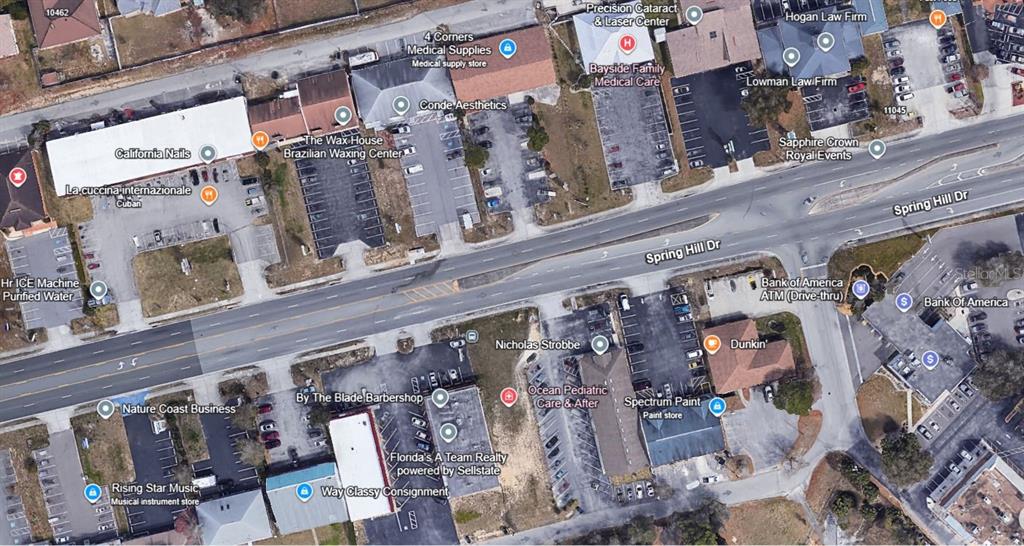 This is an aerial map view of a commercial area along Spring Hill Drive — 11001 SPRING HILL DRIVE, SPRING HILL, FL