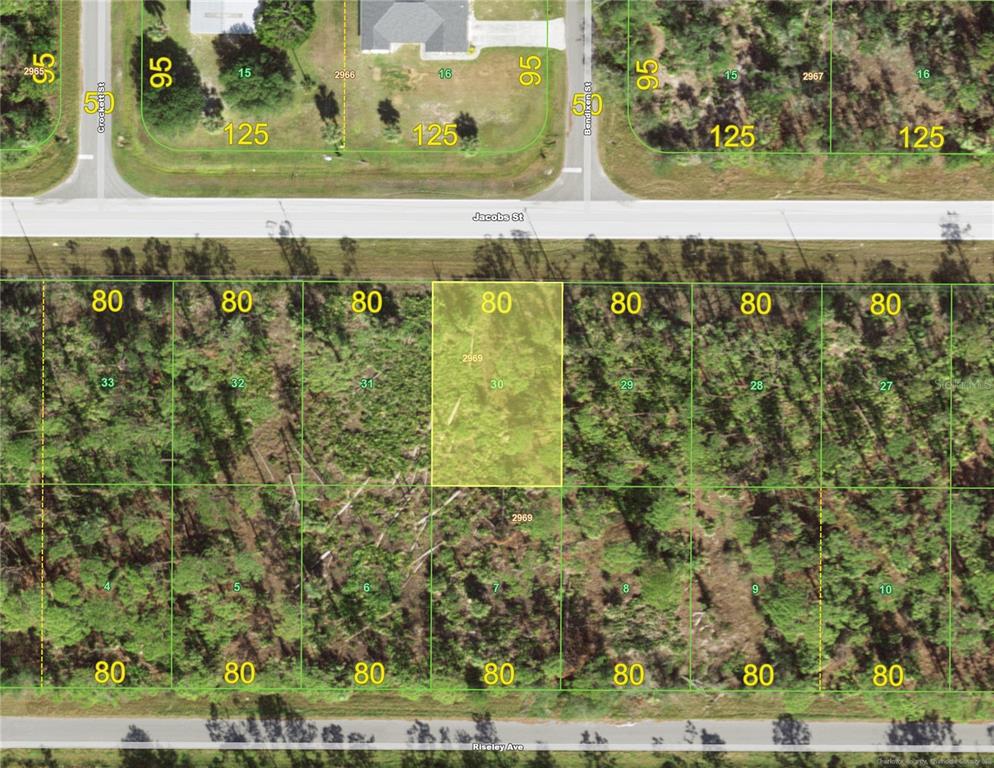 This is a map showing a highlighted vacant residential lot between Jacobs Street and Riseley Avenue — 2649 JACOBS STREET, PORT CHARLOTTE, FL
