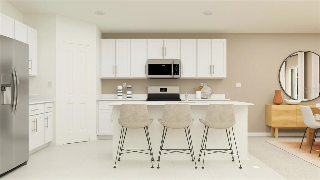 This is a virtual rendering of a modern kitchen featuring white cabinets and a center island — 2835 PIONEER TRAIL, EAGLE LAKE, FL