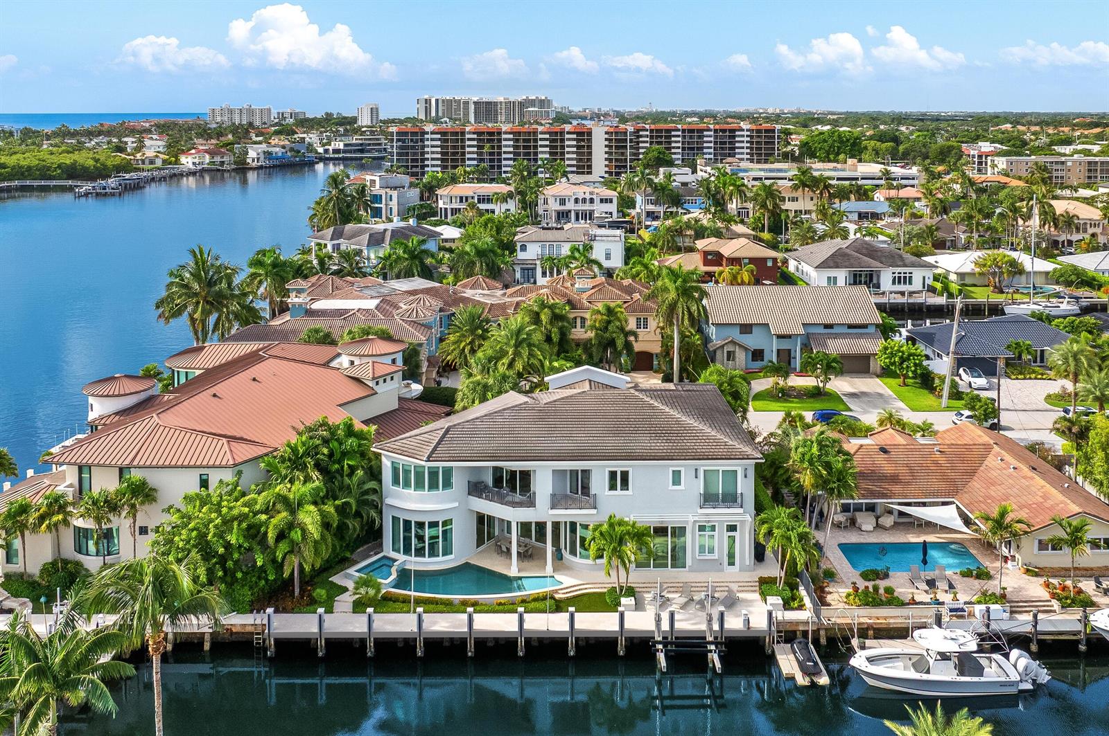 An aerial view of a waterfront house with a swimming pool and a private boat dock — 863 Enfield Street, Boca Raton FL 33487, BOCA RATON, FL