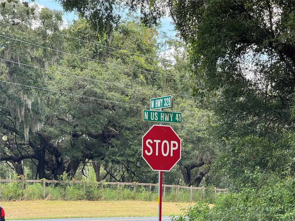A stop sign stands at the intersection of W Hwy 328 and N US Hwy 41 — 1220 N US HIGHWAY 41, DUNNELLON, FL