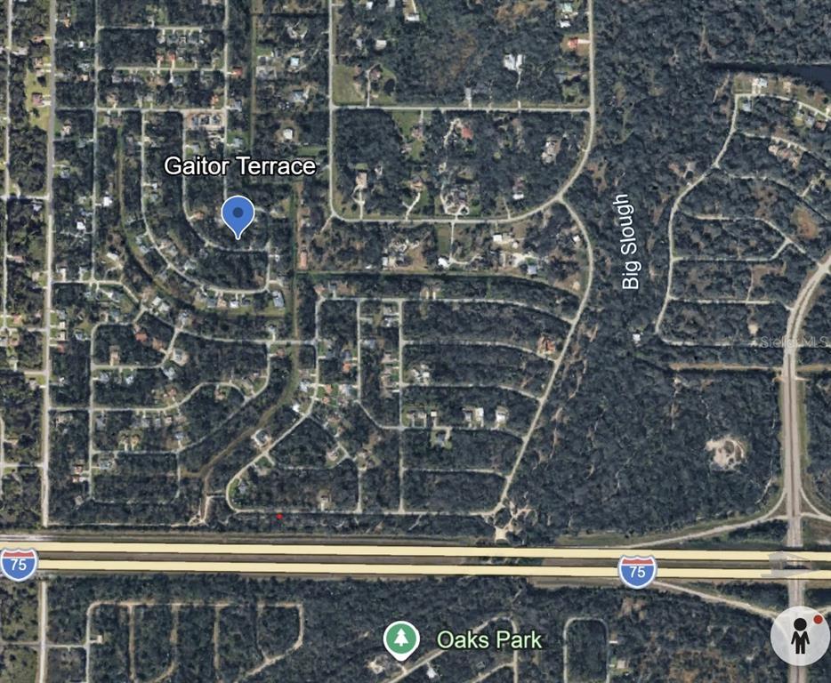 This satellite map shows residential streets near Interstate 75, Big Slough, and Oaks Park — GAITOR TERRACE, NORTH PORT, FL