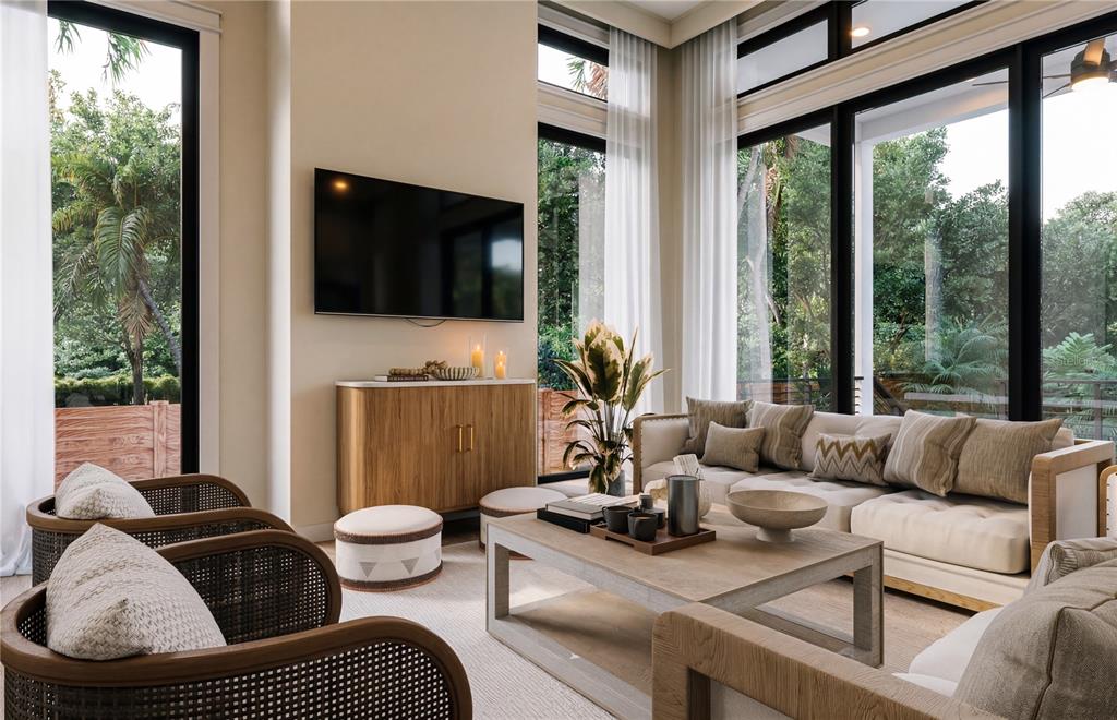 A modern living room features a wall-mounted television, wooden console, and floor-to-ceiling windows — 4183 ROBERTS POINT CIRCLE LOT 18, SARASOTA, FL