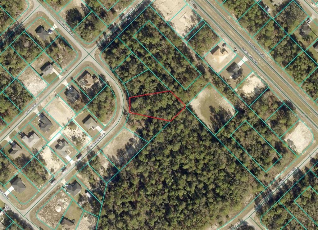 This is an aerial map showing a vacant, wooded residential lot outlined in red — 0000 SW 66TH AVENUE, OCALA, FL