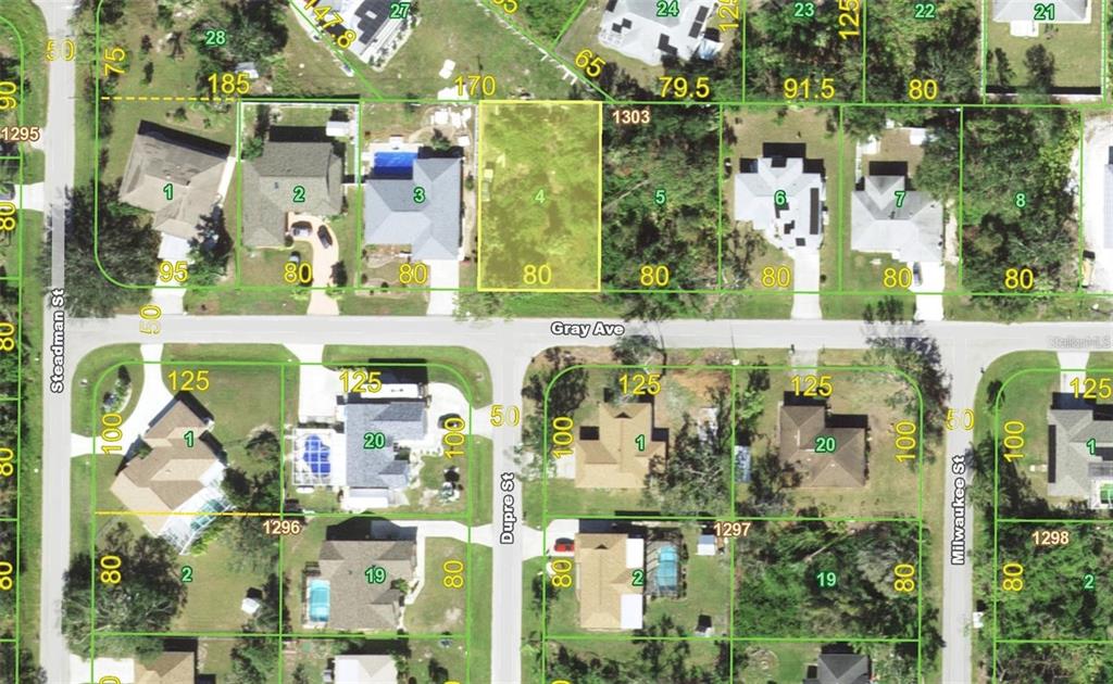 This is an aerial map showing residential lots and streets in a suburban neighborhood — 23064 GRAY AVENUE, PORT CHARLOTTE, FL