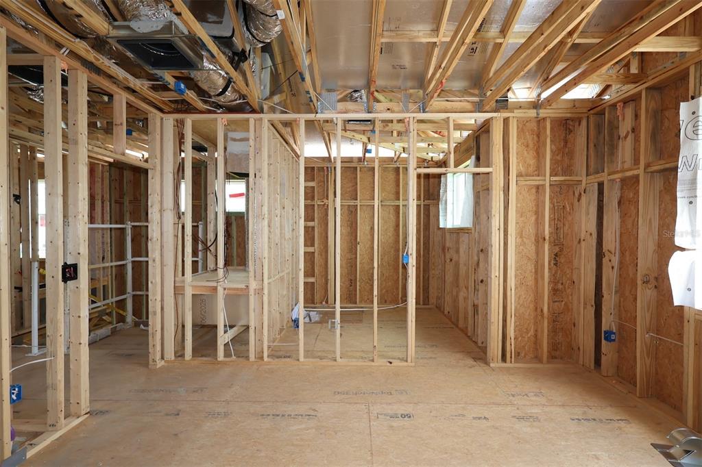 A two-story house under construction with concrete block walls and white house wrap — 5294 CENTER LAKE RANCH BOULEVARD, ST CLOUD, FL