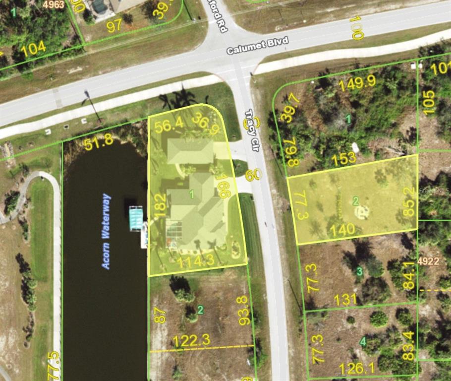 This is an aerial map showing residential lots and a waterway — 8050 TRACY CIRCLE, PORT CHARLOTTE, FL