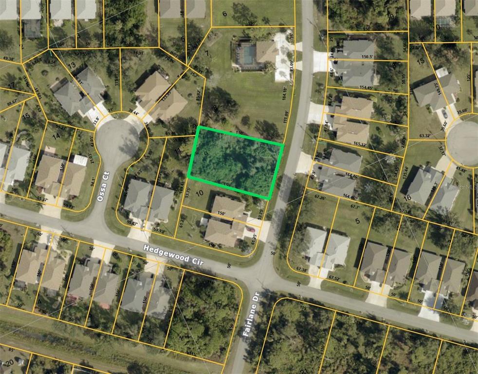 This is an aerial map showing a vacant lot highlighted in green within a neighborhood — FAIRLANE DRIVE, NORTH PORT, FL