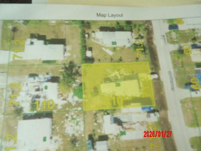 This is an aerial map layout showing property boundaries and lot dimensions — 1422 FLAMINGO DRIVE, ENGLEWOOD, FL