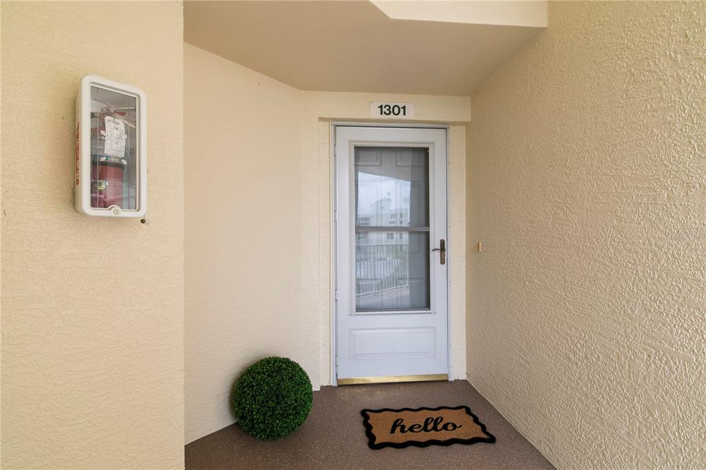 This is a floor plan for a three-bedroom, two-bathroom condominium unit — 1200 COUNTRY CLUB DRIVE UNIT 1301, LARGO, FL