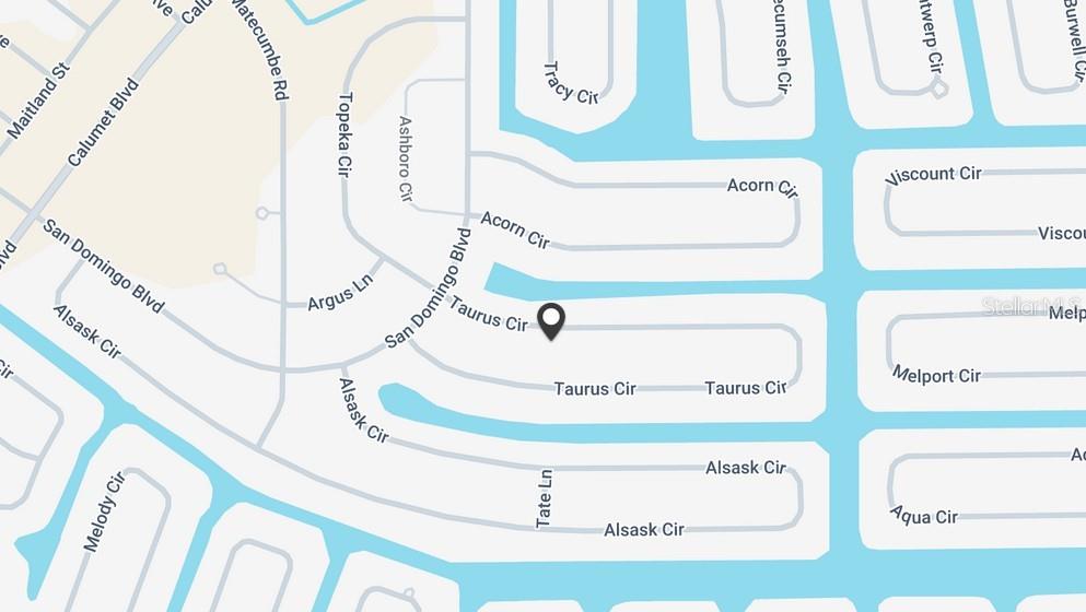 This is a map showing residential streets and waterways in a neighborhood — 15061 TAURUS CIRCLE, PORT CHARLOTTE, FL