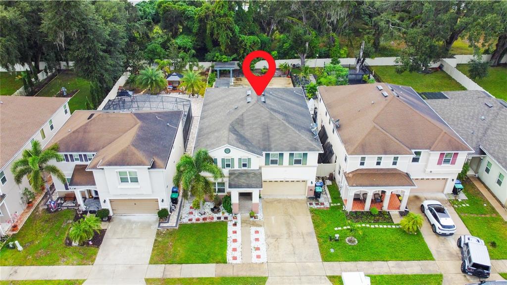 An aerial view shows a two-story suburban house with a red location pin above it — 2754 ARBOR TRAIL WAY, ORLANDO, FL