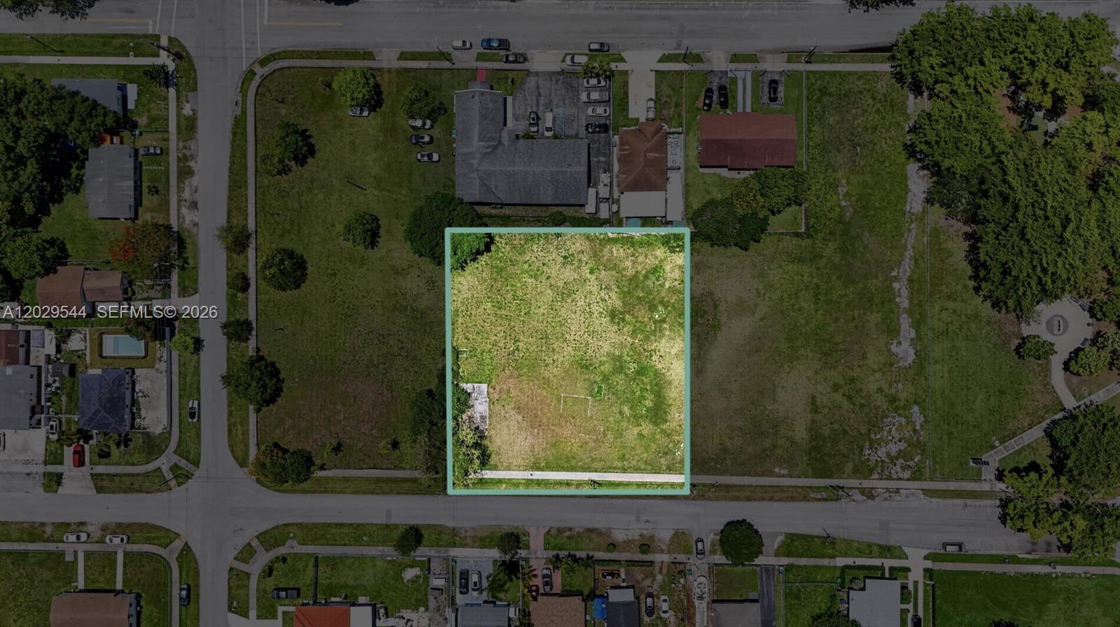 An aerial view shows a rectangular vacant lot highlighted in green within a residential neighborhood — 10330 SW 178th St, Miami FL 33157, MIAMI, FL