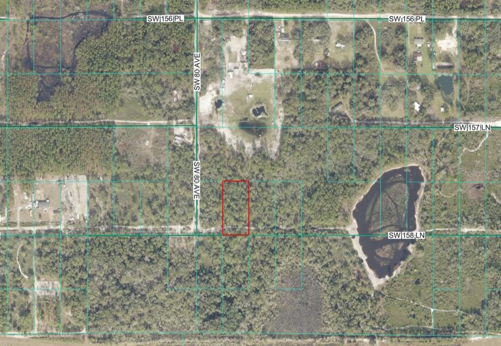 An aerial map shows a rectangular lot outlined in red near a dirt road — Tract 418 SW 158TH LANE, DUNNELLON, FL