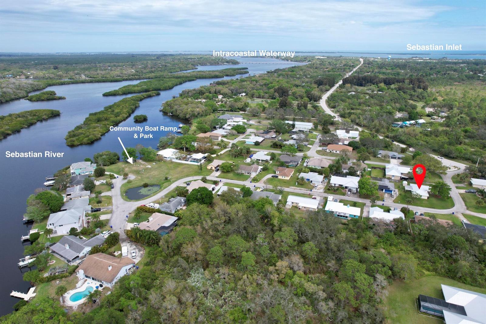 This aerial view shows a residential neighborhood near the Sebastian River and Intracoastal Waterway — SEBASTIAN, FL